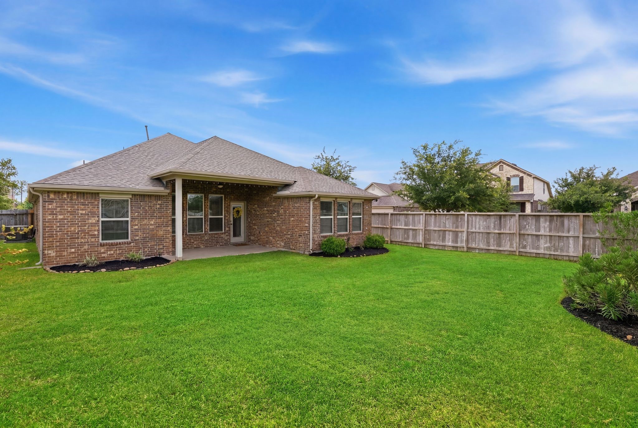 18227 Tacoma Ridge Drive Tomball, TX 77377 - Photo 36 of 45 Spacious backyard with room for gatherings, play, or gardening.