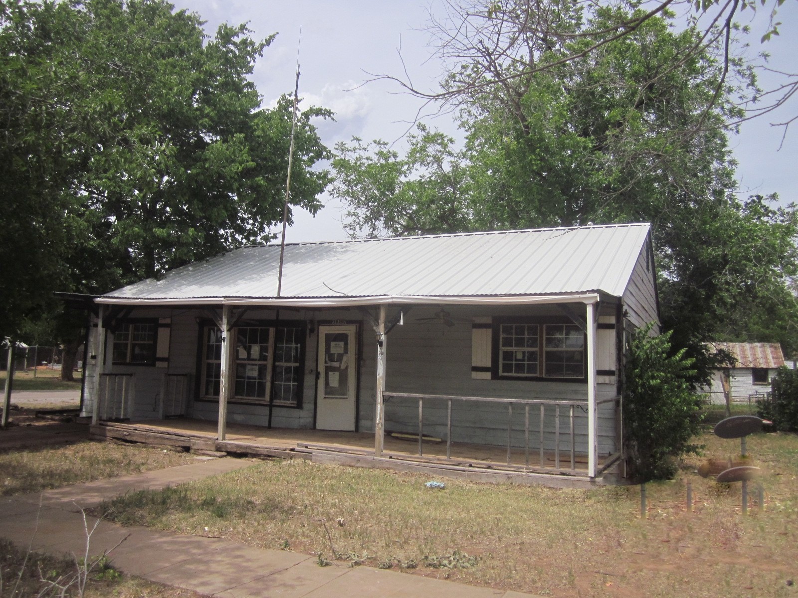 401 Ave F Southeast Childress, TX 79201 - Photo 2 of 10 a house view with a outdoor space