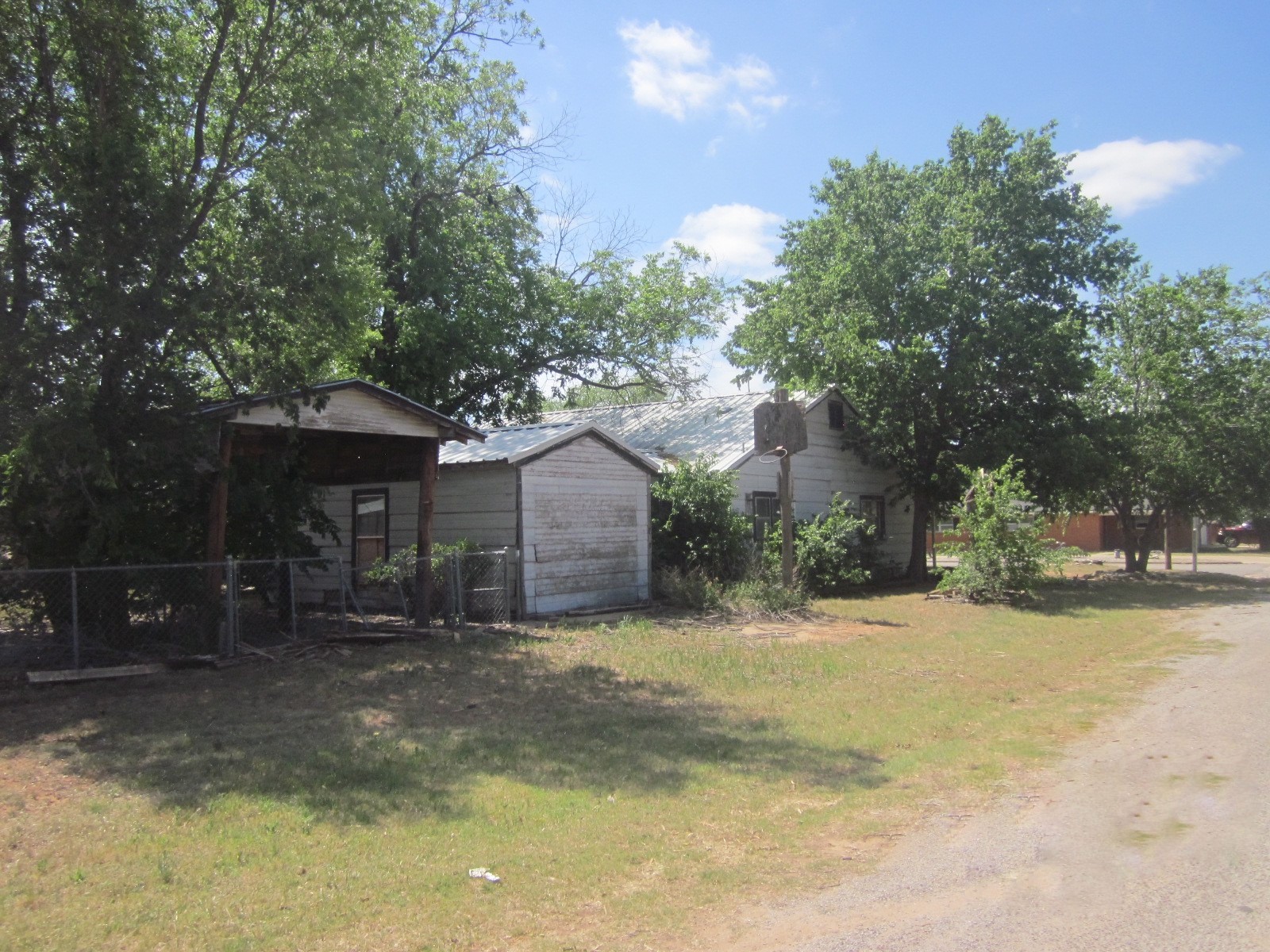 401 Ave F Southeast Childress, TX 79201 - Photo 5 of 10 a view of a house with a yard