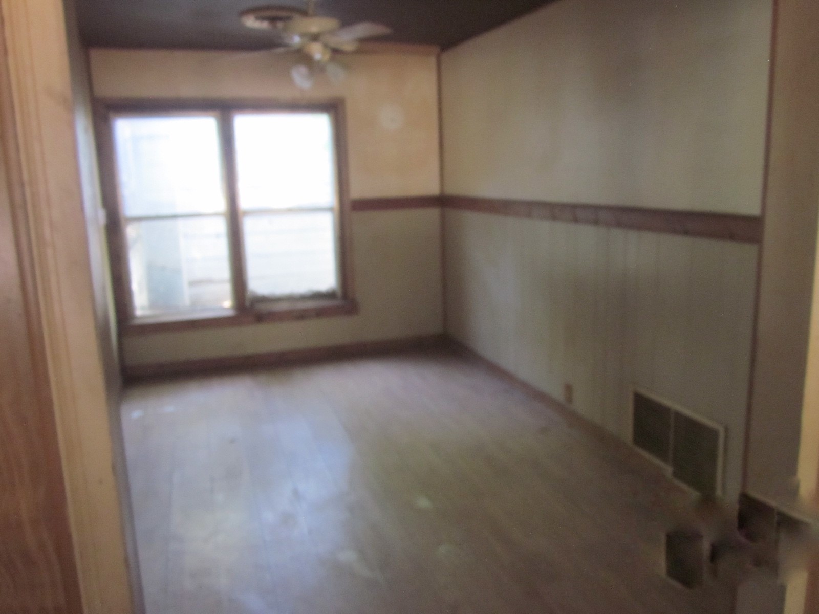 401 Ave F Southeast Childress, TX 79201 - Photo 8 of 10 an empty room with a window