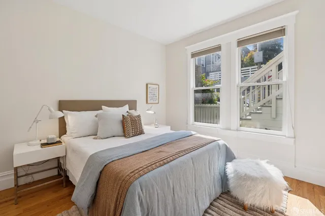 a view of a hallway with washer and dryer