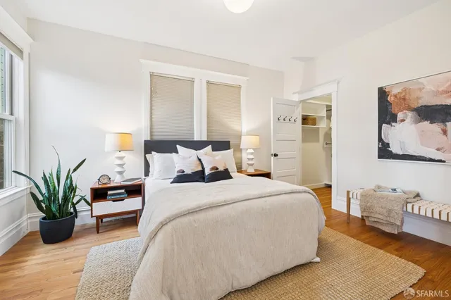 a bathroom with a sink a mirror and shower