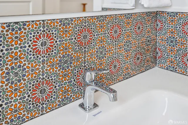 a view of a patio with couches table and chairs and potted plants