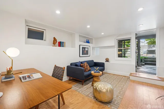 a picture of a wall with a white wall and a white refrigerator