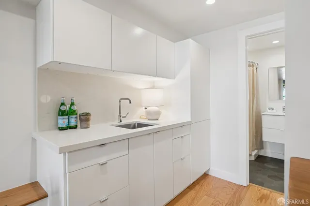 a view of a building with a palm tree