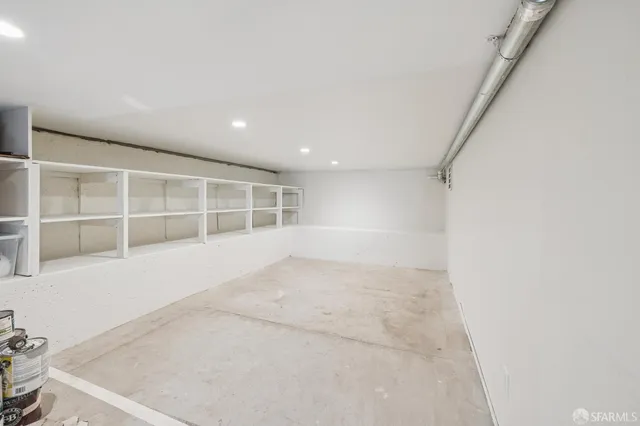 a view of a building with retail shops