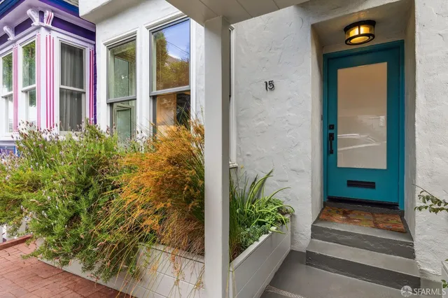 a front view of a house with parking