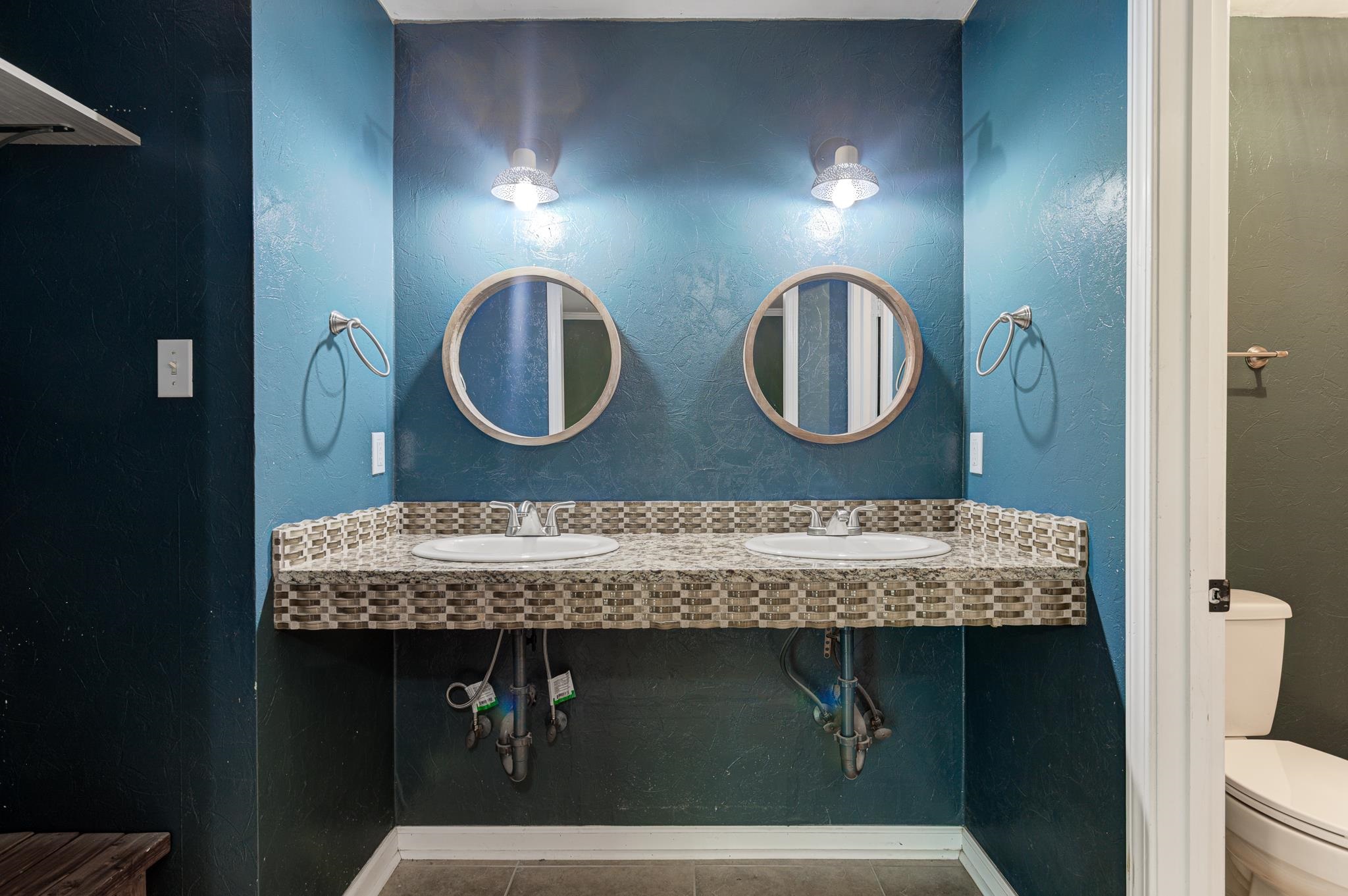 218 South Walnut Bend Road Memphis, TN 38018 - Photo 12 of 25 Bathroom featuring a textured wall and tile patterned floors