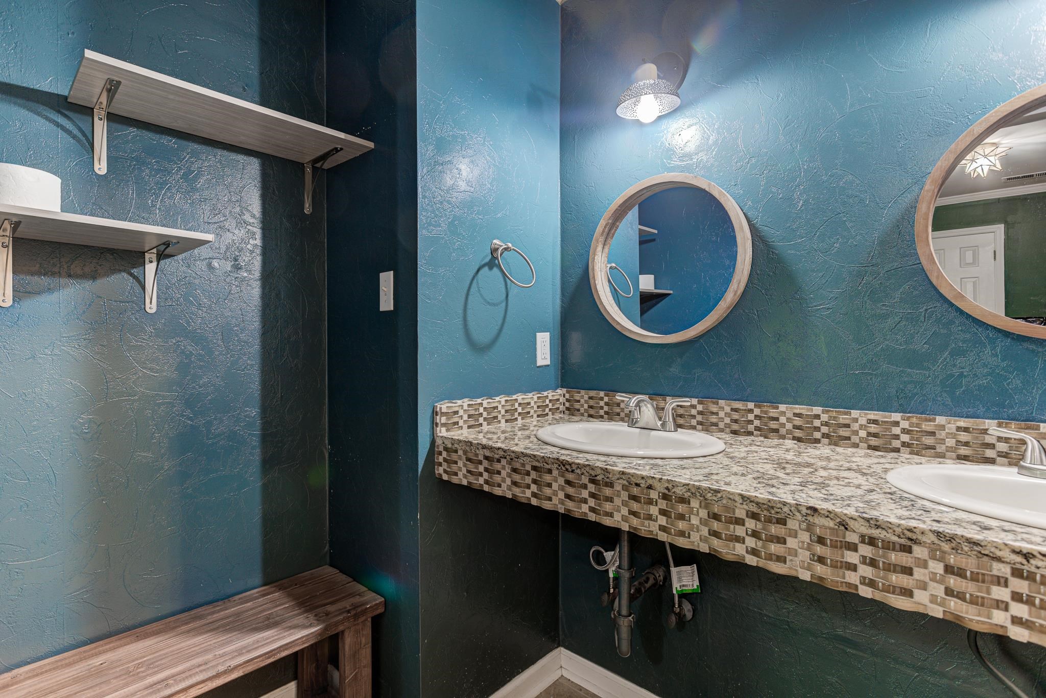 218 South Walnut Bend Road Memphis, TN 38018 - Photo 13 of 25 Bathroom with a textured wall and double sink