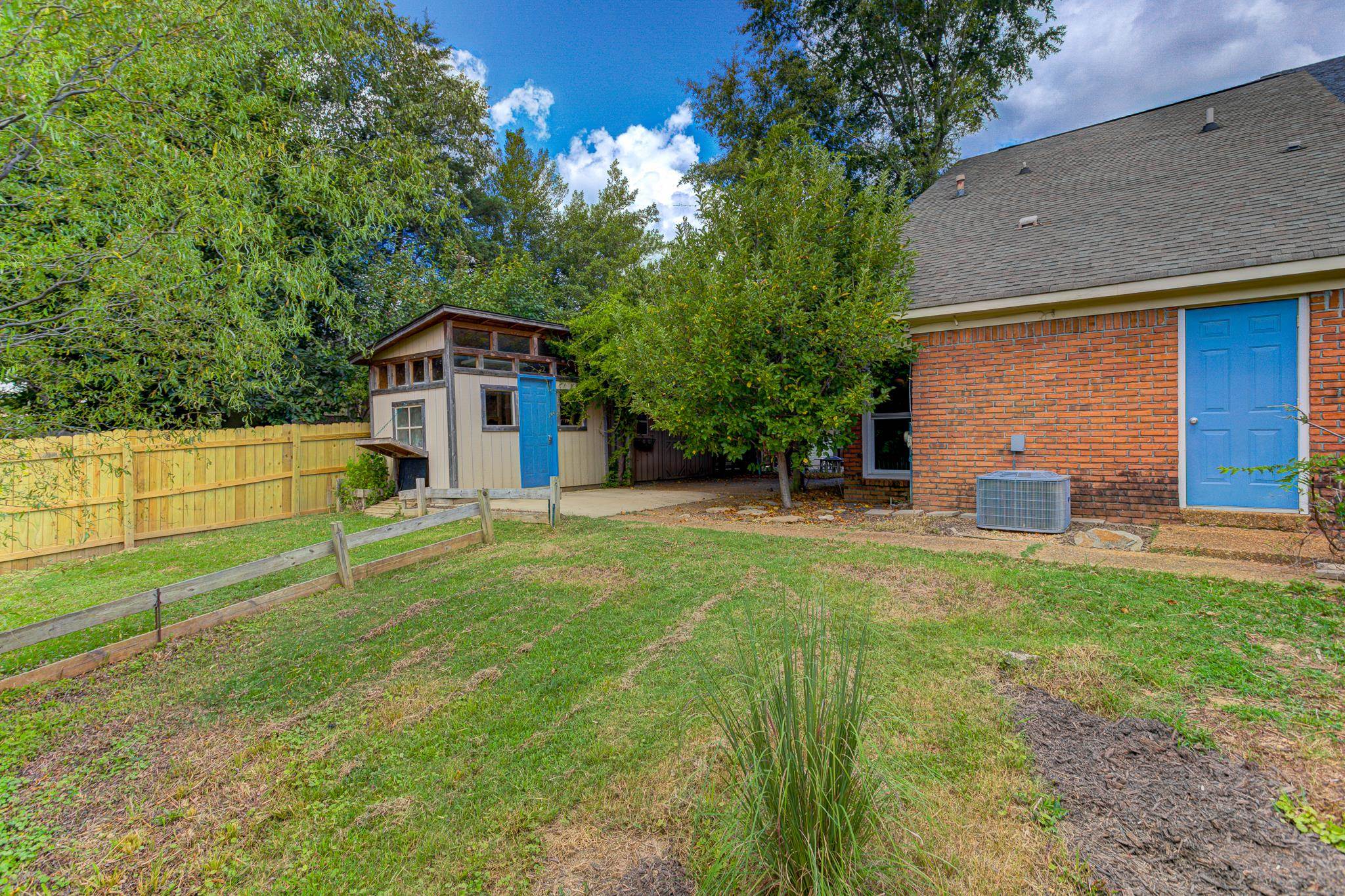 218 South Walnut Bend Road Memphis, TN 38018 - Photo 22 of 25 View of yard with an outdoor structure and a patio area