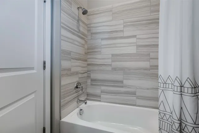 a bathroom with a bathtub