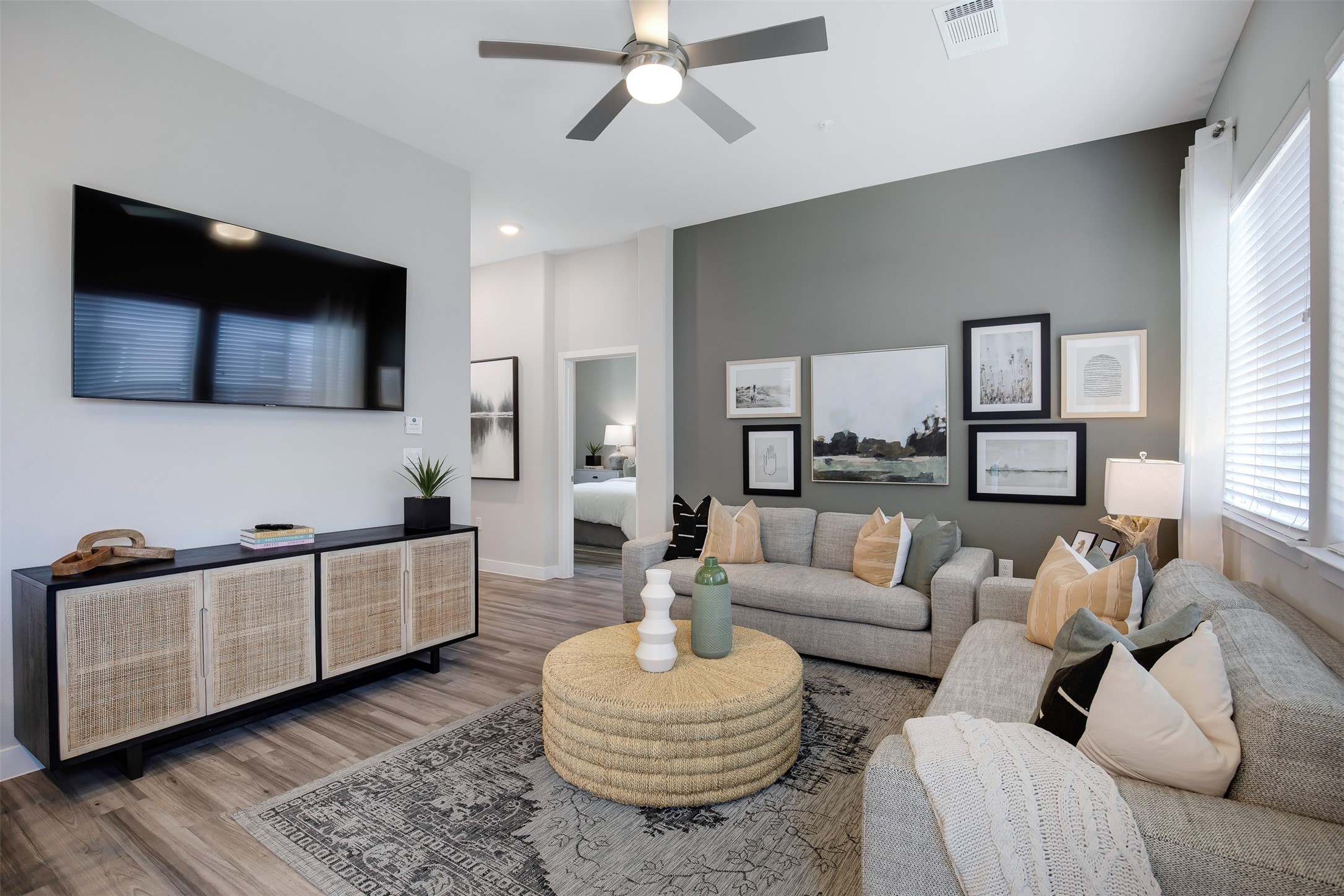7225 Rustle Road Fort Worth, TX 76123 - Photo 8 of 38 a living room with furniture and a flat screen tv