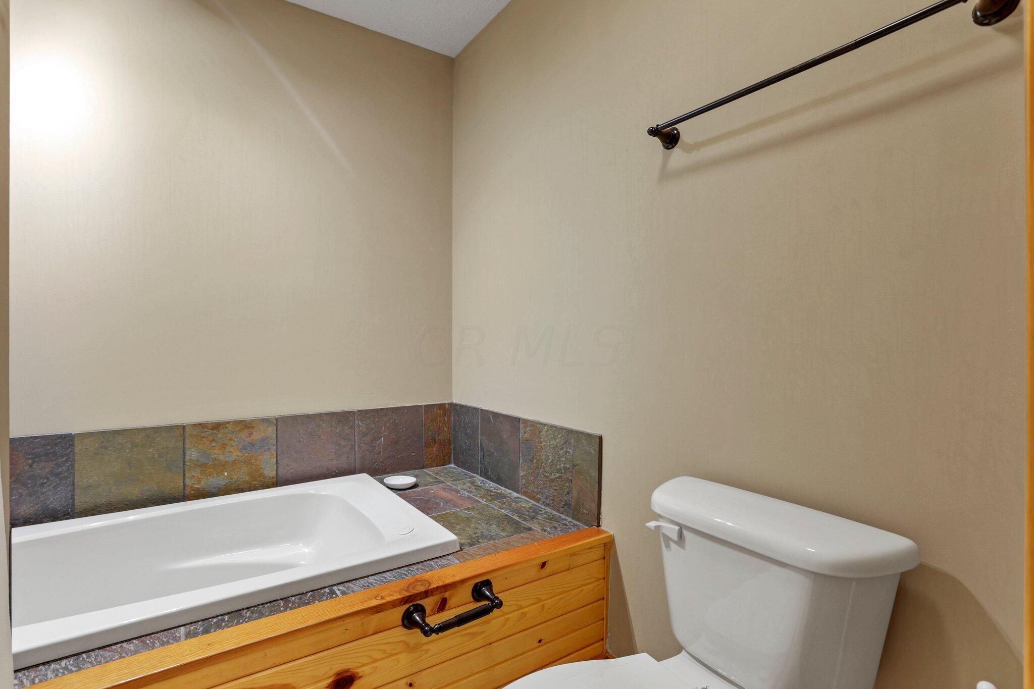 18397 Goat Run Honey Fork Road Logan, OH 43138 - Photo 30 of 65 Main Floor Primary Bathroom