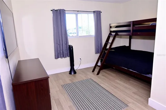 a room with gym equipment and a window