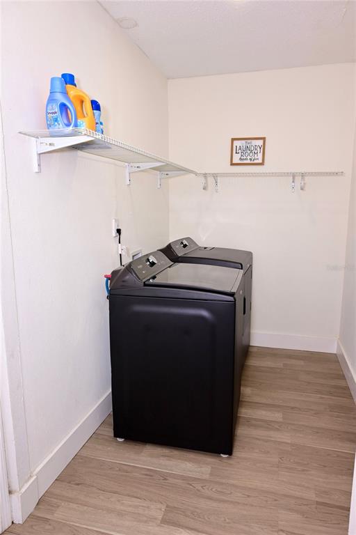 306 Fern Road Winter Haven, FL 33880 - Photo 15 of 20 a utility room with washer and dryer