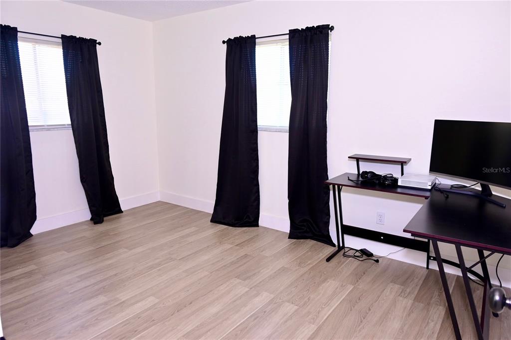 306 Fern Road Winter Haven, FL 33880 - Photo 17 of 20 a view of workspace with hardwood floor