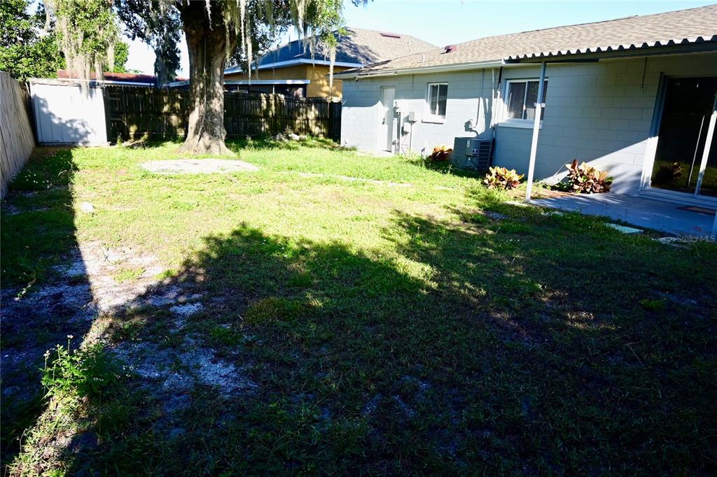 306 Fern Road Winter Haven, FL 33880 - Photo 19 of 20 a front view of a house with a yard