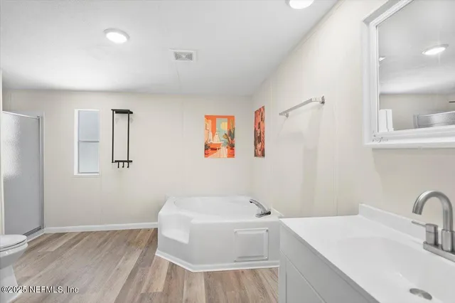 a bathroom with a sink and a bathtub