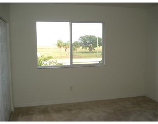1964 Alamanda Way, Unit 40 Riviera Beach, FL 33404 - Photo 10 of 16 Master Bedroom