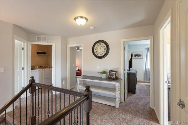 a view of a hallway with a bedroom