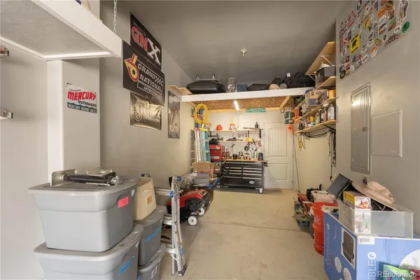 a view of a building with furniture and outdoor space