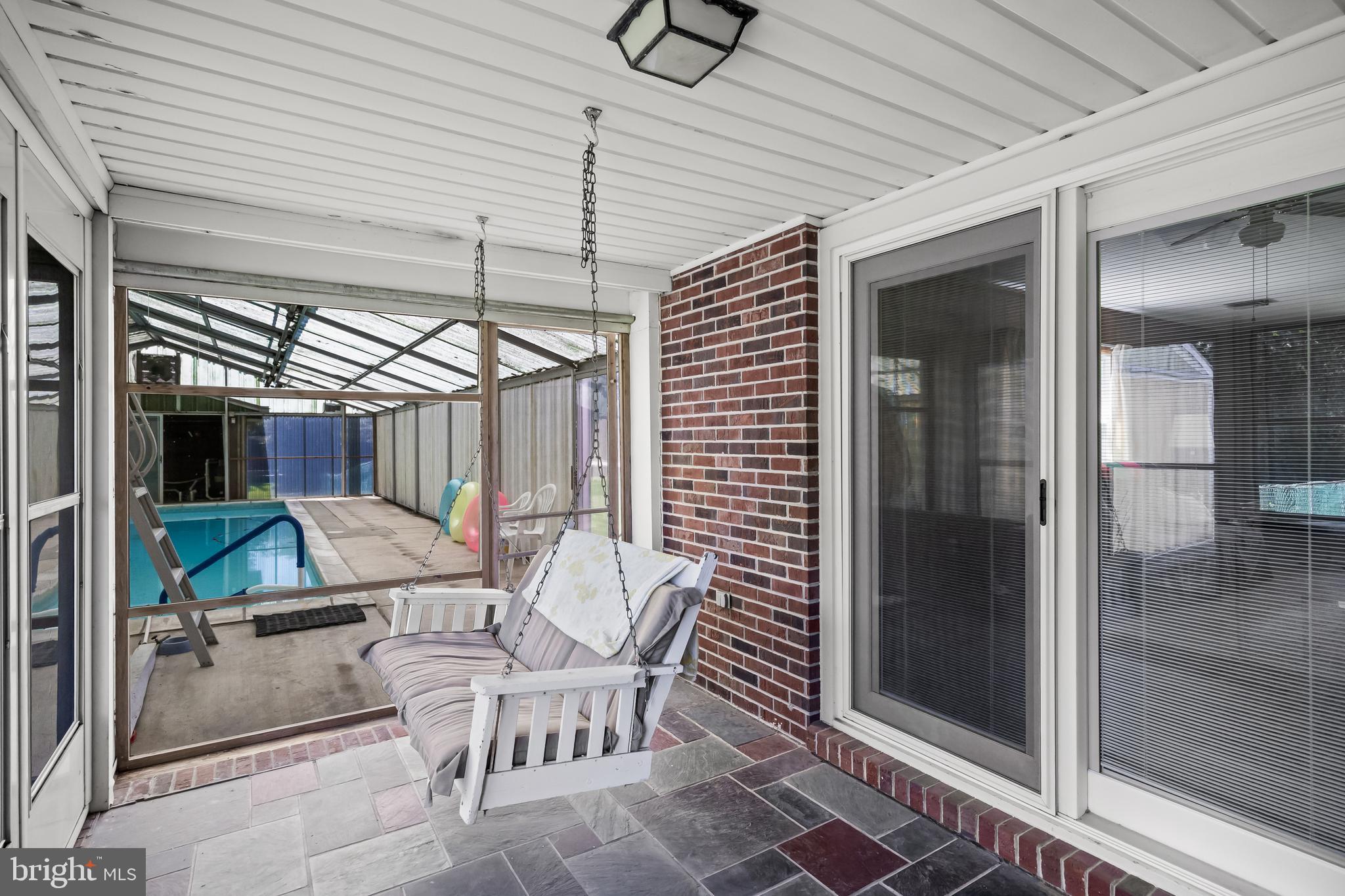 44 Supawna Road Pennsville, NJ 08070 - Photo 19 of 56 a view of a patio with table and chairs and potted plants
