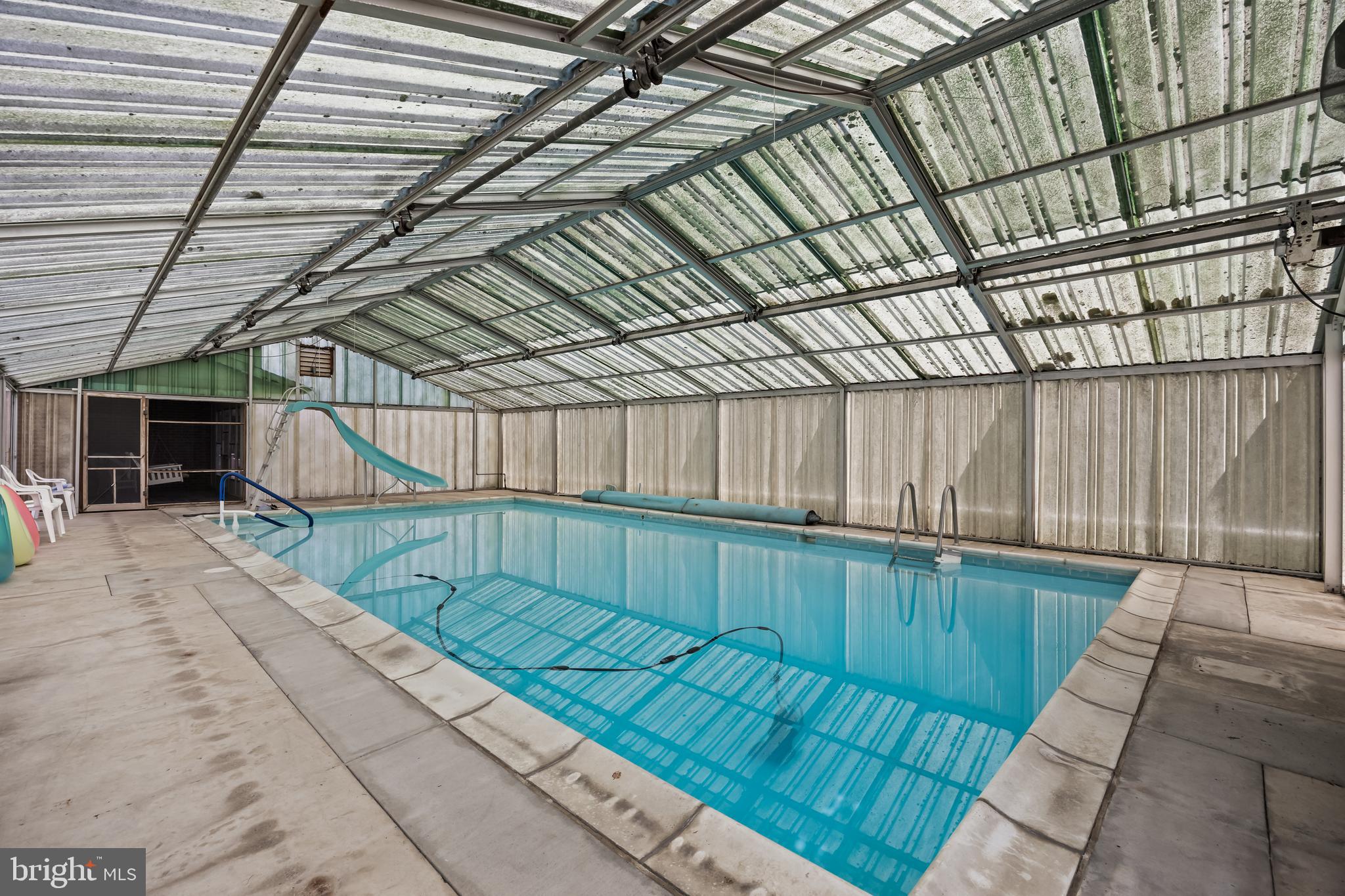 44 Supawna Road Pennsville, NJ 08070 - Photo 21 of 56 a view of swimming pool with wooden walls