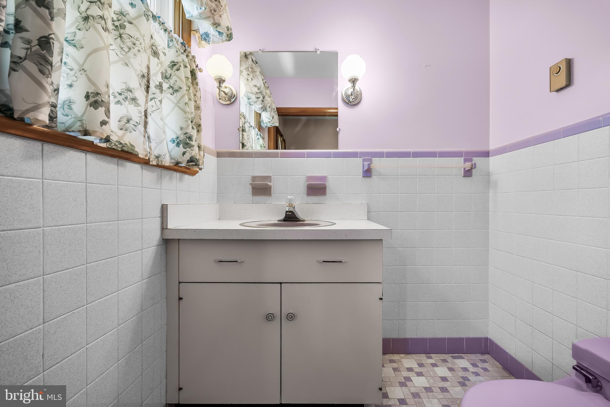 44 Supawna Road Pennsville, NJ 08070 - Photo 23 of 56 a bathroom with a sink and a mirror