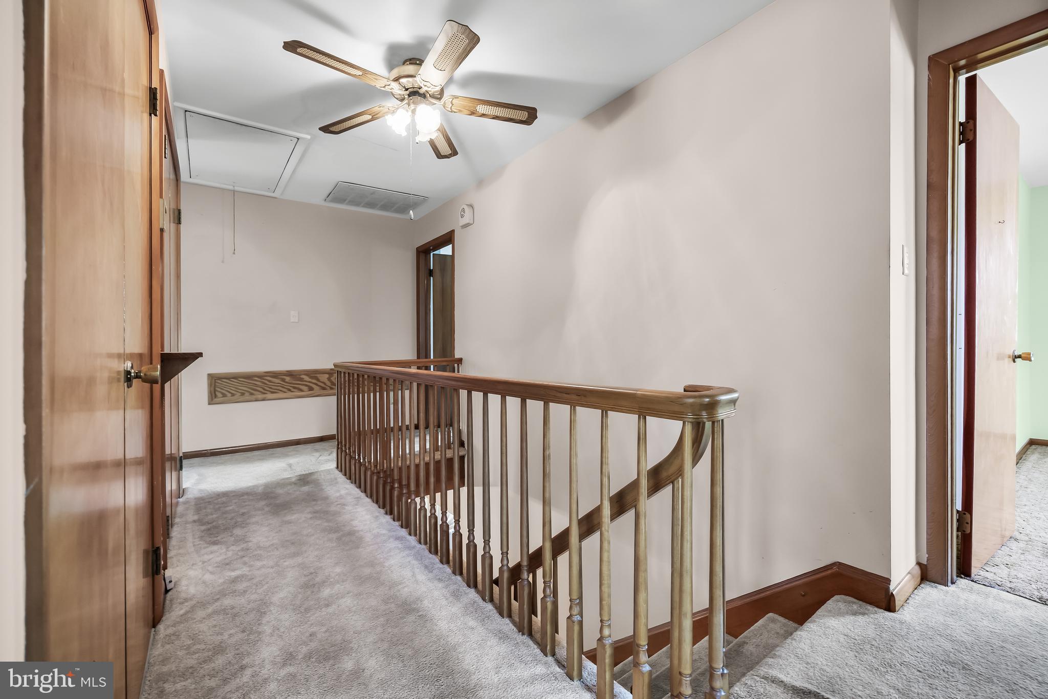 44 Supawna Road Pennsville, NJ 08070 - Photo 25 of 56 a view of a hallway with a chandelier fan