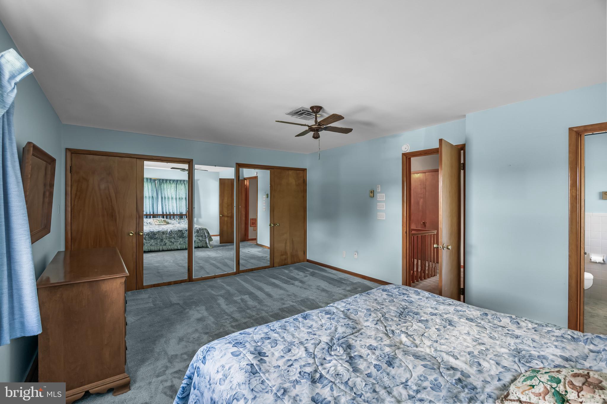 44 Supawna Road Pennsville, NJ 08070 - Photo 27 of 56 a bedroom with a bed and glass door