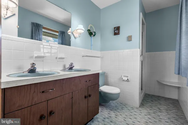 a room with window and cabinet