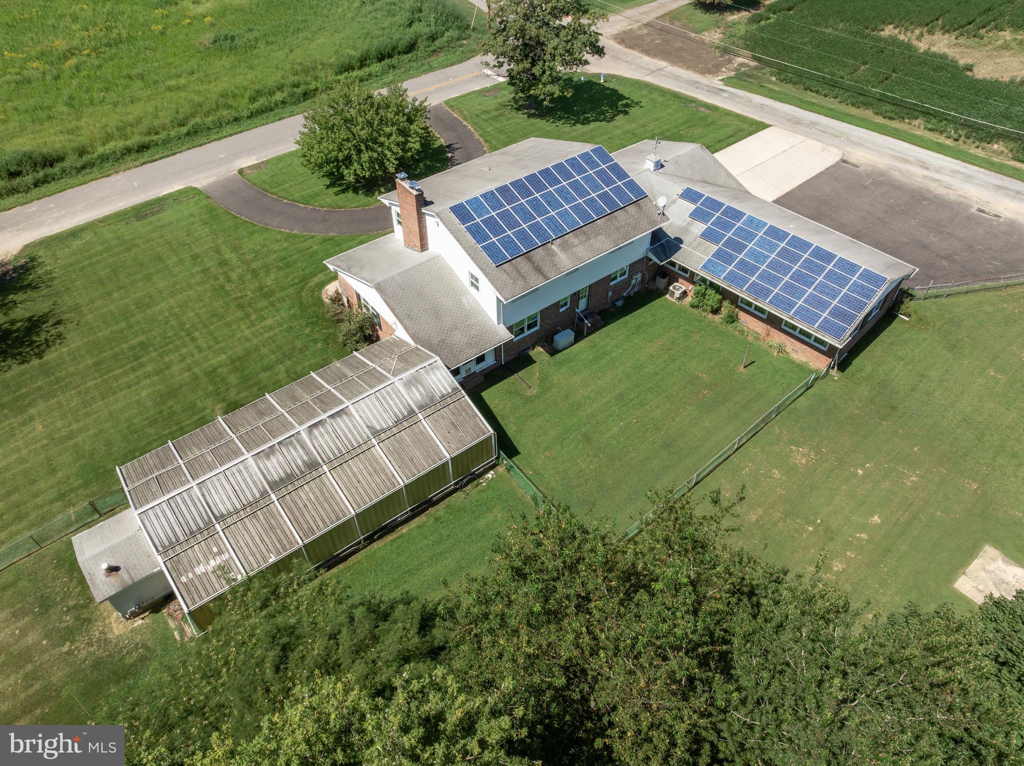 44 Supawna Road Pennsville, NJ 08070 - Photo 53 of 56 an aerial view of a house with garden space and street view