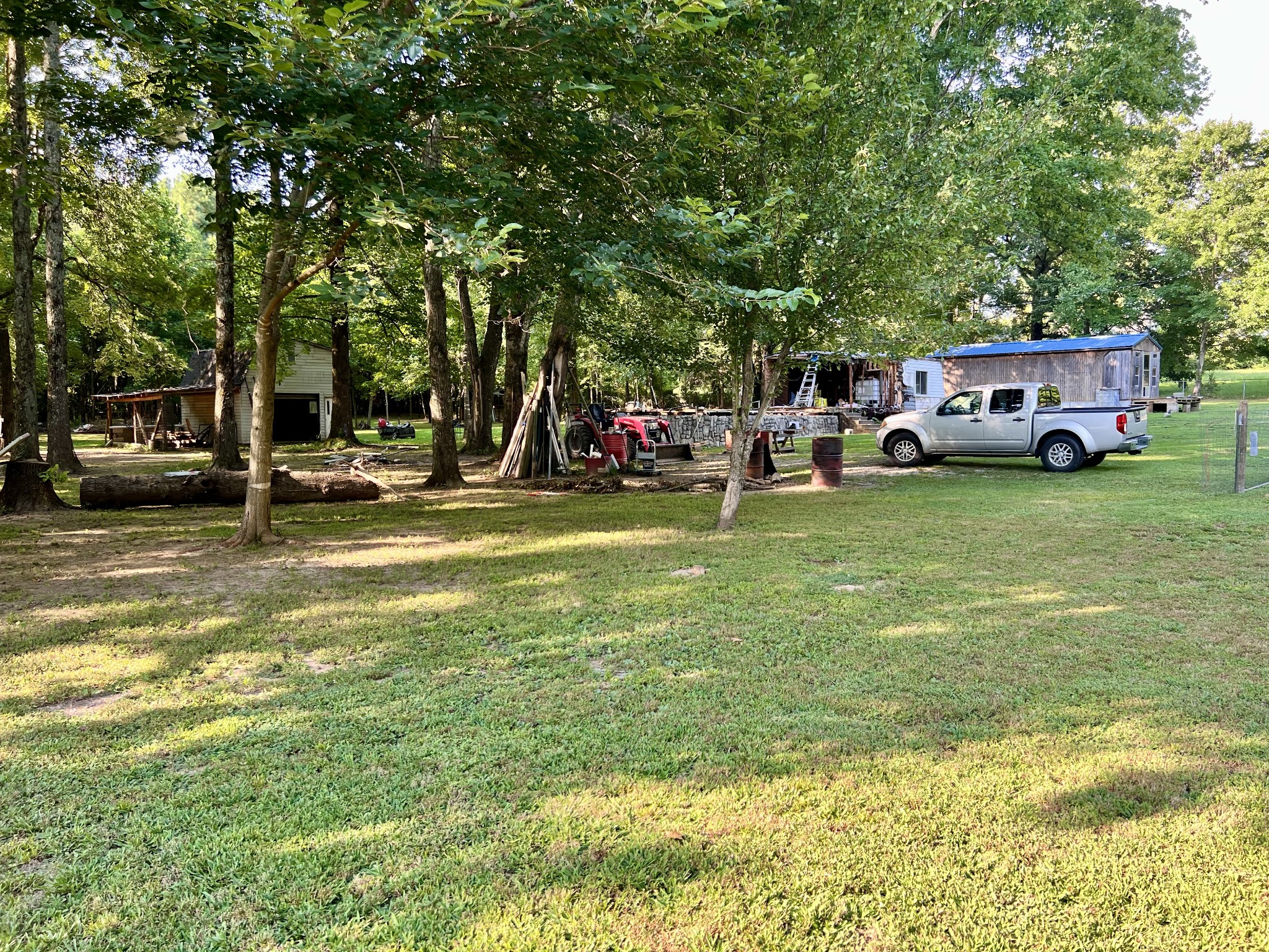 a front view of a building with parked cars