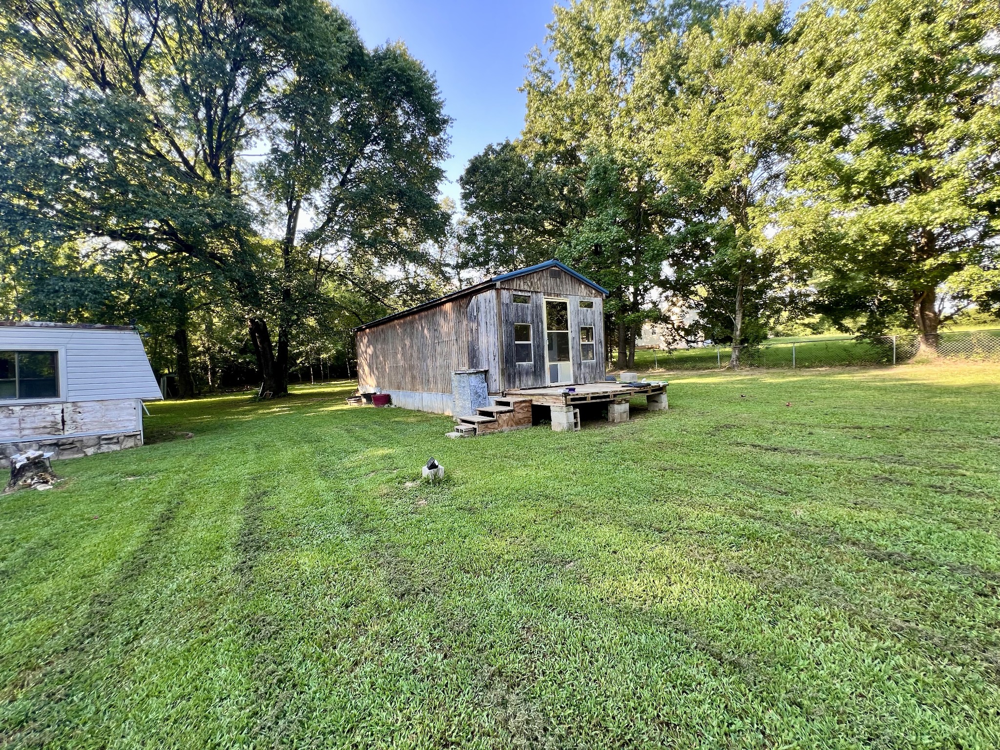 1020 Fall River Road Goodspring, TN 38460 - Photo 23 of 37 a view of a house with a backyard