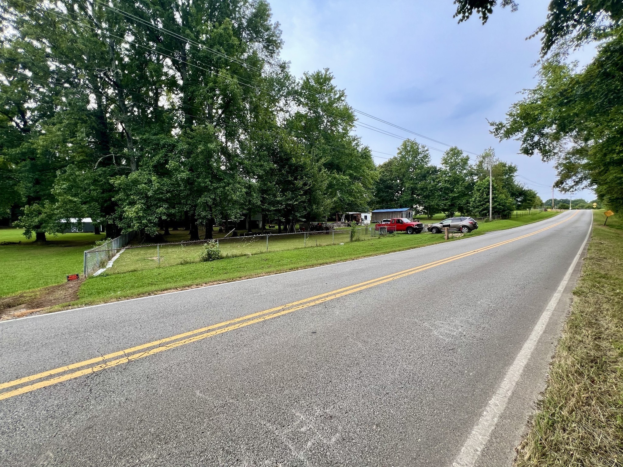 1020 Fall River Road Goodspring, TN 38460 - Photo 29 of 37 a view of a road with a big yard and a large trees