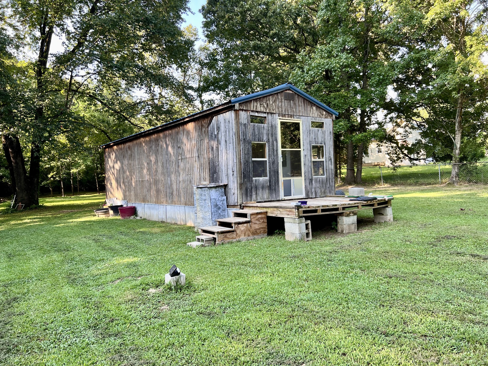1020 Fall River Road Goodspring, TN 38460 - Photo 3 of 37 a view of backyard with wooden fence and a bench