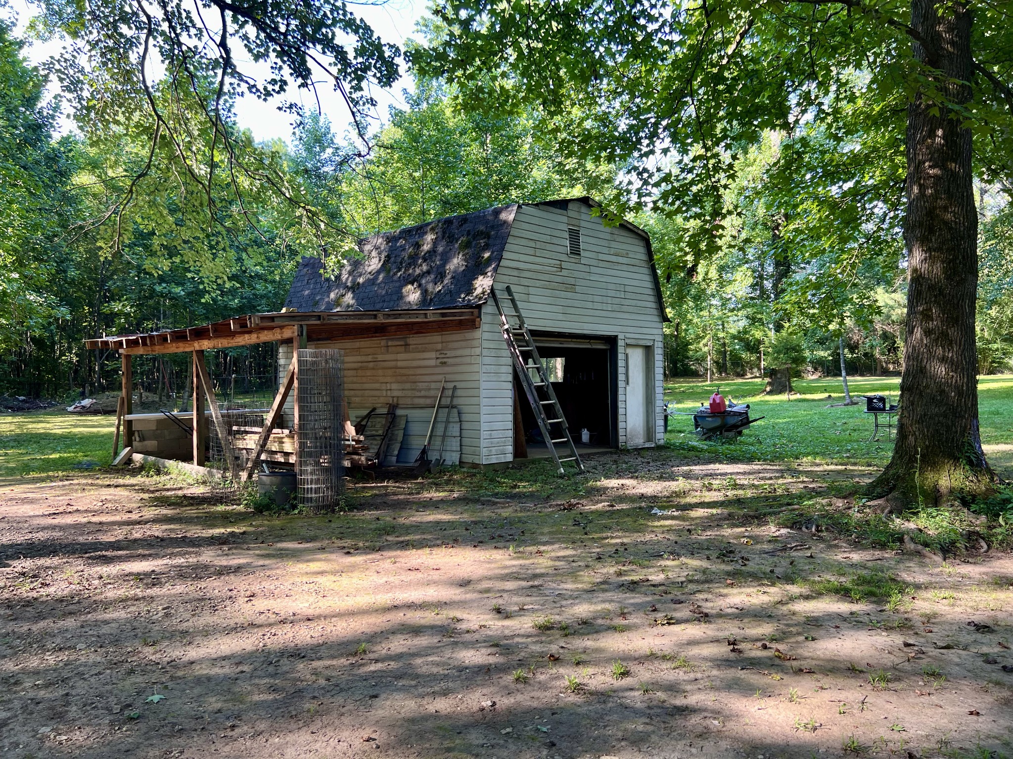1020 Fall River Road Goodspring, TN 38460 - Photo 7 of 37 a front view of a house with garden