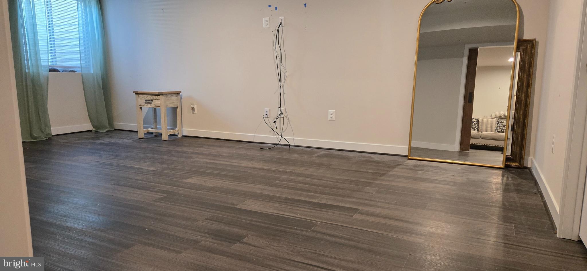 6005 Calla Place Frederick, MD 21703 - Photo 18 of 30 a view of a room with wooden floor