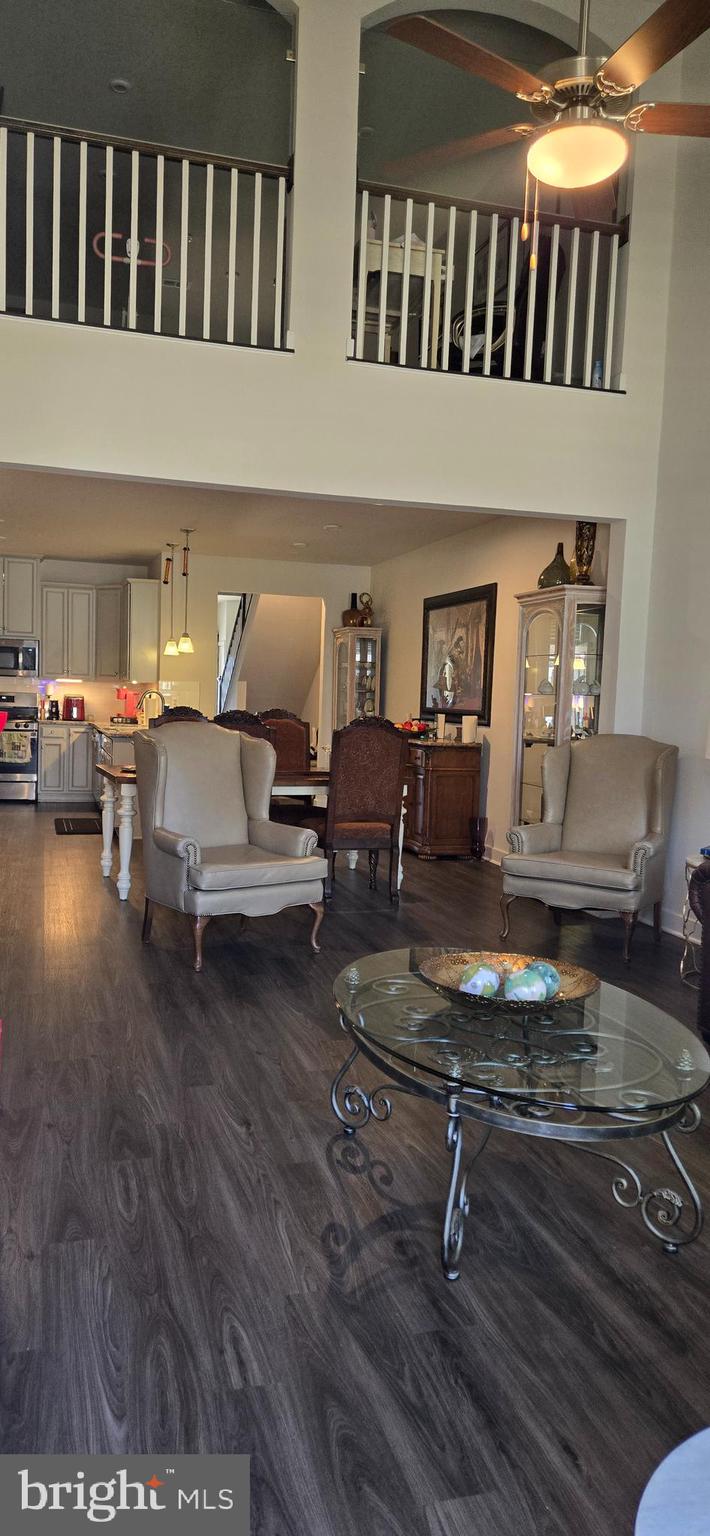 6005 Calla Place Frederick, MD 21703 - Photo 4 of 30 a living room with furniture