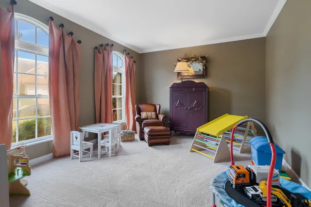 a view of a bathroom with a tub shower and sink