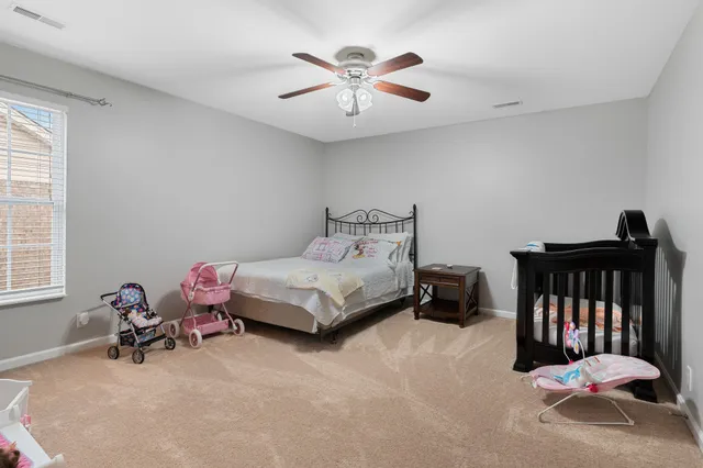 a bathroom with a sink toilet and mirror