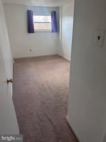 a view of a yard with an outdoor seating