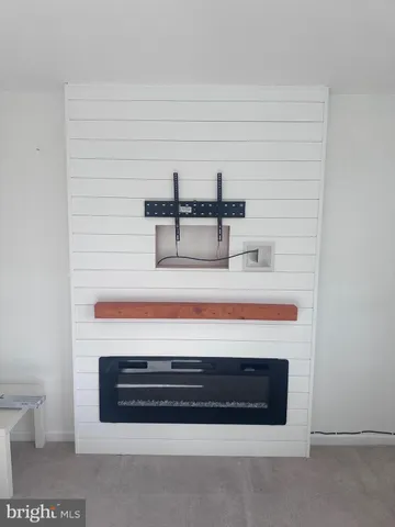 a view of a livingroom with furniture and wooden floor
