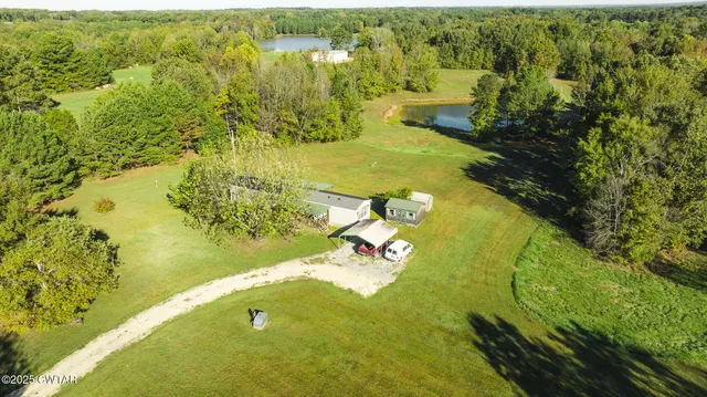 a view of a yard with an outdoor space