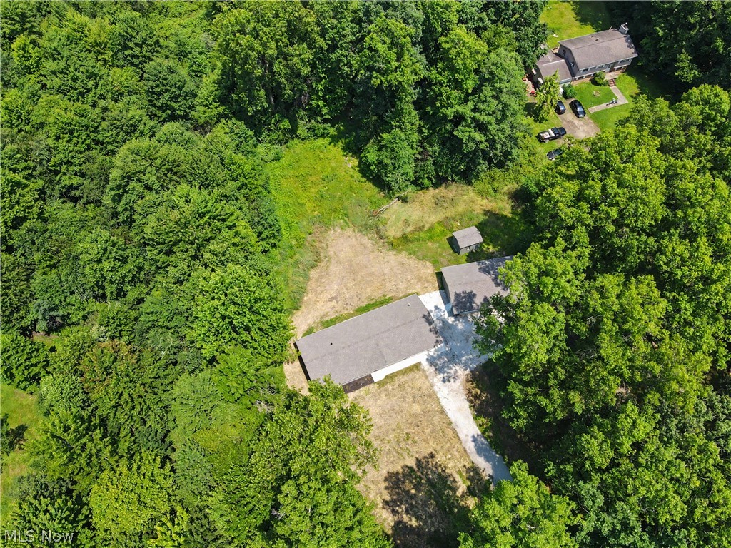 7583 Yale Road Atwater, OH 44201 - Photo 2 of 41 Easy one floor living home sits of the road nestled in the mature trees.
3.38 acres of land.