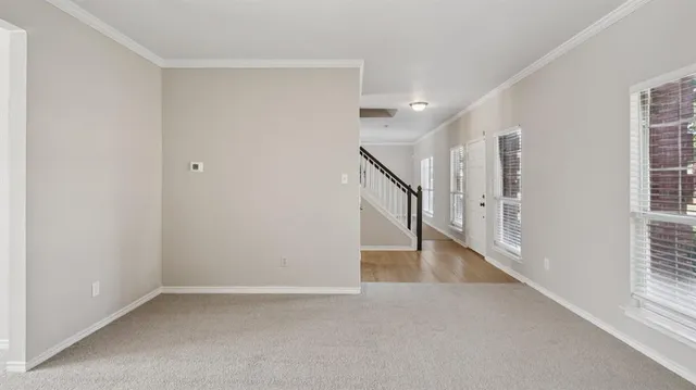 a view of an entryway with stairs