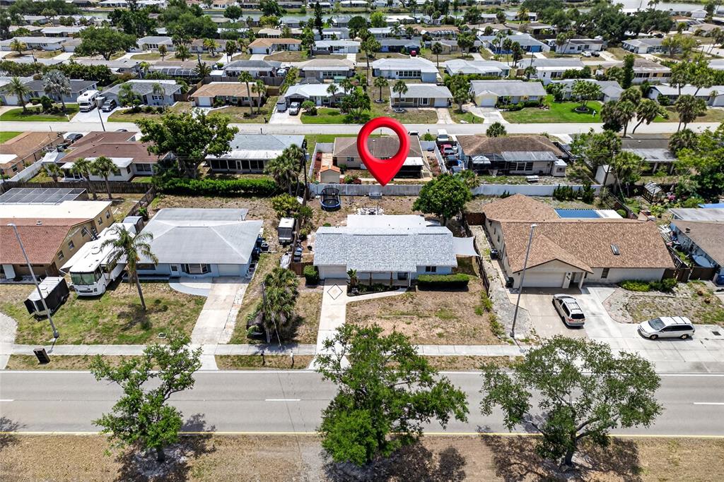 532 Center Road Venice, FL 34285 - Photo 12 of 68 an aerial view of residential house with an outdoor space and seating area