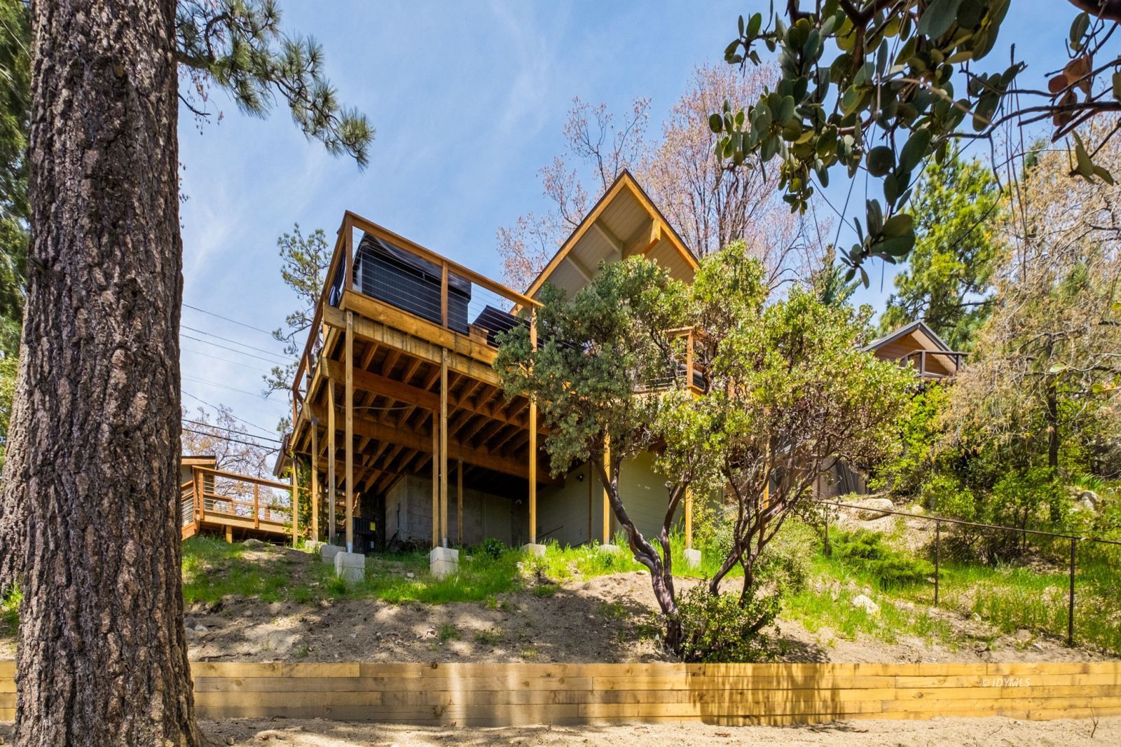 24750 Marion Ridge Drive Idyllwild, CA 92549 - Photo 45 of 45 front view of a house with a tree