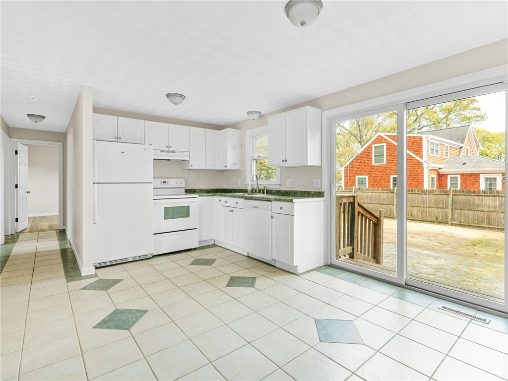 4 Ellsworth Street Warwick, RI 02886 - Photo 11 of 30 Kitchen with slider to back patio