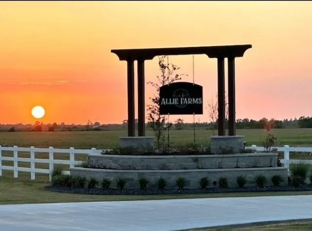 a front view of a building with garden